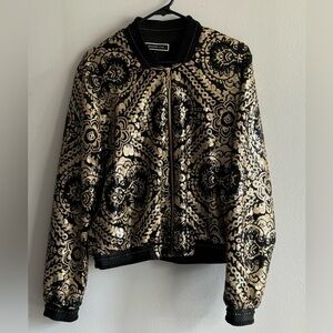 Sequin gold and black bomber jacket. Size 12. Zipper works great.